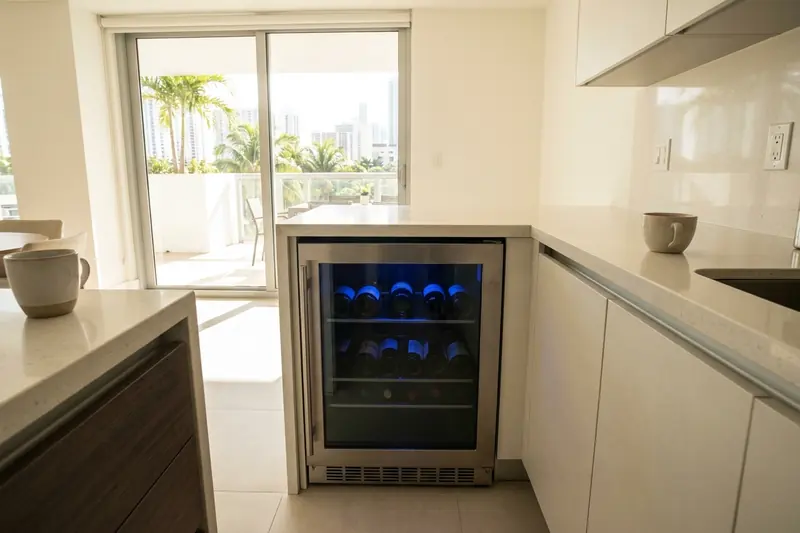 Built-in wine cooler in a Miami condo kitchen